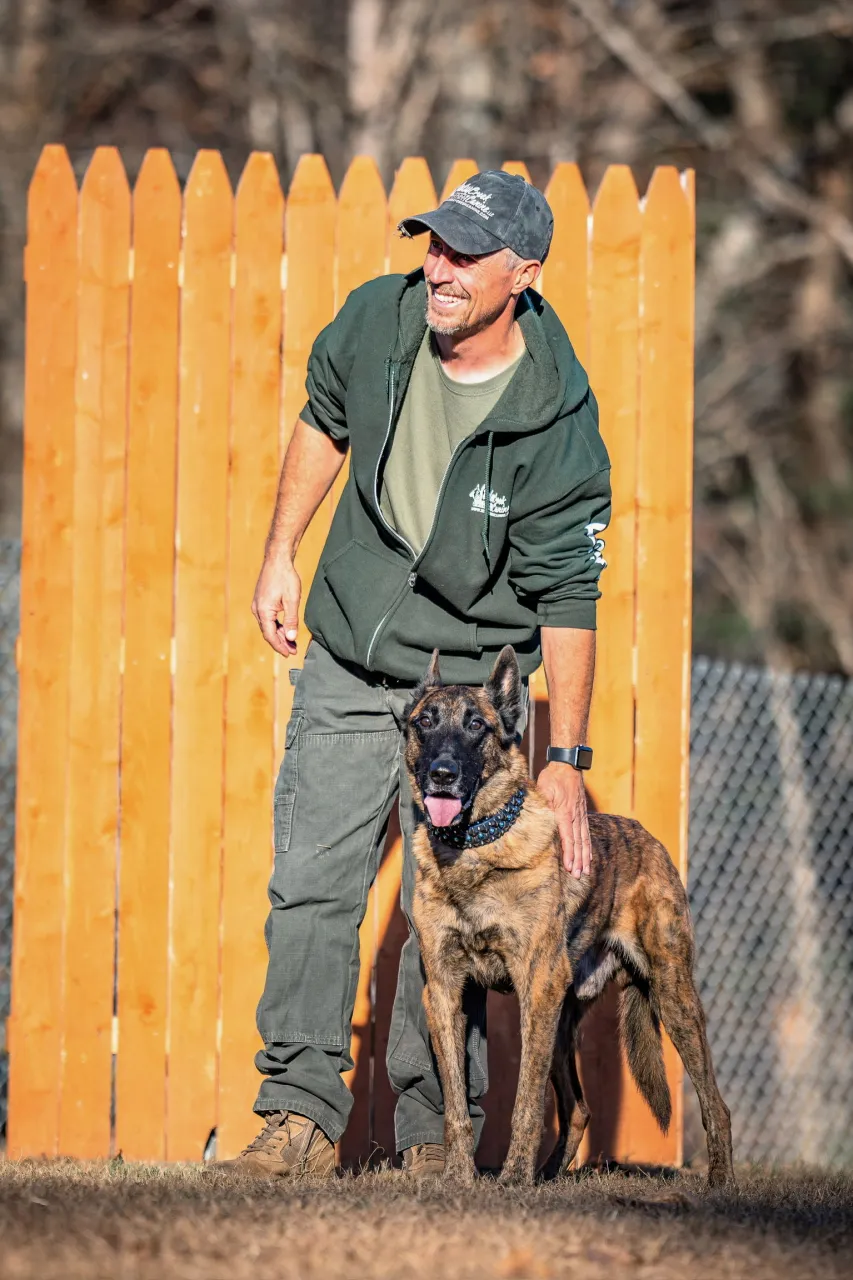 Eric Galayda with a Belgian Malinois